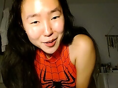 Shaved Asian cougar squirting while masturbate on webcam