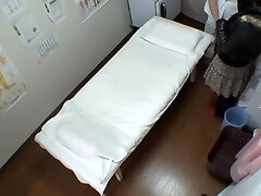 Big booty Japanese caught in a spycam massage video