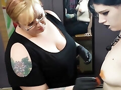 goth nymph gets her nipple pierced