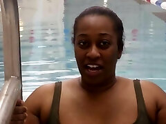 BBW Black woman put a pink spandex swimcap