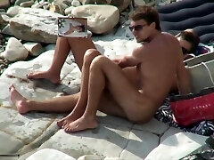 Breasty bi-atch sucking cock on a beach