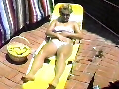 Homemade video of a solo nymph wearing nylon stockings having fun