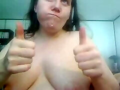 White trash whore on webcam chews banana and displays it