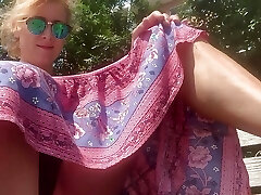 Black panties exhib in long miniskirt