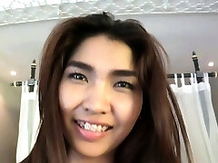 Big boob Tittiporn sucks a rock-hard cock