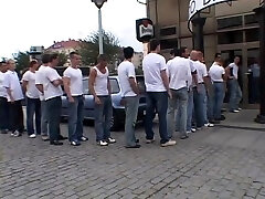 Slutty brunette boinked stiff by 30 men in this gangbang film