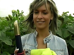 Pulling her rosy panties aside for a nice long vibrator