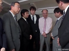 Big-chested Asian slut gets gang banged by horny businessmen