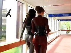 2 hot gals in tight latex catsuits