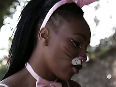 Dark-hued dame Nikki Darling is having sex with a white dude