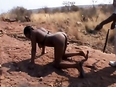 African babe gets whipped in the middle of nowhere