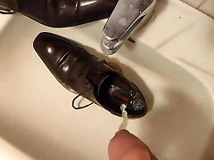 Piss in dudes's dress shoe