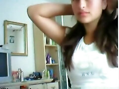Cute brunette girl plays with her ginormous tits and shaved pussy on cam