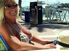 Horny cougar with in a bikini bangs hard on a luxurious yacht
