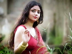 Poundable Indian AUnty Rupashree In Red Sari outside