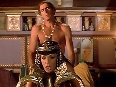 Lean and lascivious Cleopatra getting boned in doggy style position