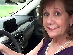 Brunette Demi wearing black lingerie pleasuring her trimmed cunt