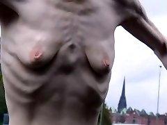 a bony mature woman with small empty saggy tits