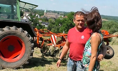 Leaned over the tractor mature village slut gets nailed from behind