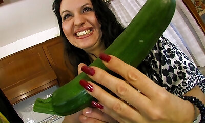 Chubby mature sticks everything in her ass and pussy