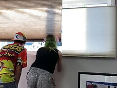 Couple Peeping Outside Apartment Window
