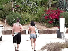 While on the beach vacation the brunette gets flirted with picked up and fucked relentlessly