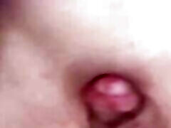 Flashing her ass and shaking her dick