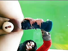 Bottom view, slave in blom ada judul belt takes big toys into his hole.