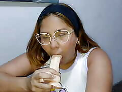 Latina sucking and fucking a dildo