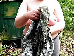 Slapping her hanging tits in the woods