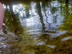 Pissing and cum on her face at the creek