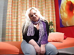 German bbw blonde strokes her big tits in the presence of a watcher who films her masturbating her pussy with sex toys