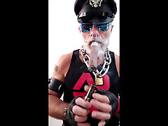 Leather Stepdad Lighting a Big Ring Leather Stepdad Lighting a Big Ring