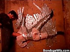 Mature blonde slut is fastened against Mature blonde slut is fastened against