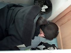 Crouching toilette black hair woman wiping her ass after taking a shit