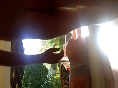 Amateur fucking teen in front of window