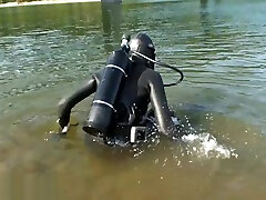 Rubber girl dive with black FFM
