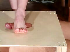 Dominatrix bare feet cock stomping & footjob with huge cumshot pt2