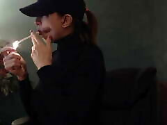 Smoking 120 wearing sweater