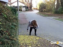 Naughty slim amateur black head crouches and pisses on her way home